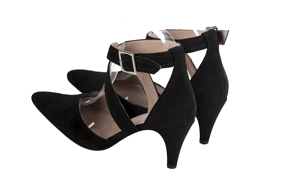 Women's matt black open side dress shoes, with crossed straps. Tapered toe. High slim heel - Rear view